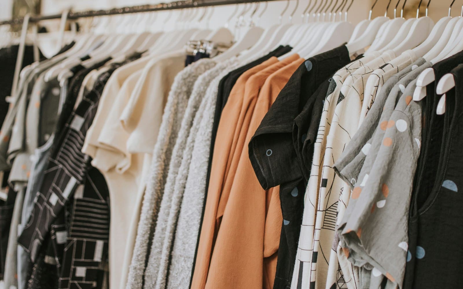 PayGift clothing collection on a rack